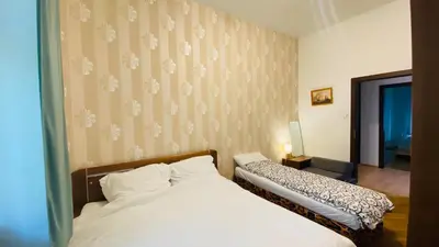 a bedroom with two beds in a room at Prague service Apartment - Central square location in Prague