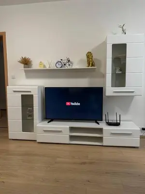 a flat screen tv sitting on a white entertainment center at Royal Stay Wenceslas Square in Prague