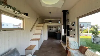an interior view of a tiny house with a living room at Tiny House in Stará Boleslav