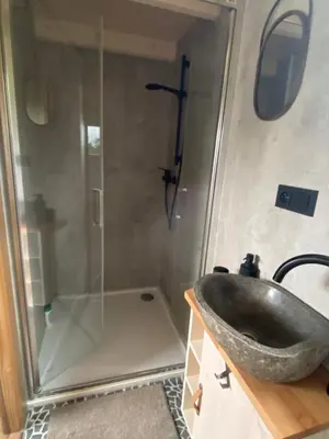 a bathroom with a sink and a shower at Tiny House in Stará Boleslav