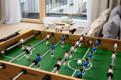 a lego soccer game in a living room at Stylish Flat by the Metro in Prague