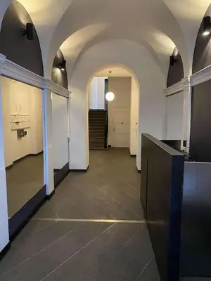 a room with a hallway with arched ceilings and a hallway with a hallway at Cozy Luxe Home at the Heart of Old Prague Centre in Prague