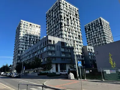 two tall buildings in a city with a street at Old town view BOUTIQUE APARTMENT with FREE PARKING in Prague