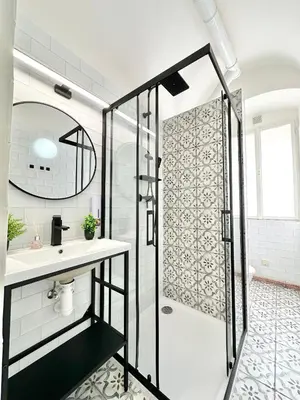 a bathroom with a shower and a sink at The Little Peaceful Retreat in Prague