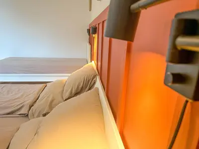 a bedroom with two beds in a room at Elegant Apartment Near Main Station & Wenceslas Sq in Prague