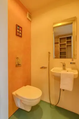 a bathroom with a toilet and a sink at LOcelot Premium 2 floor Apartment near O2 Arena in Prague