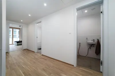 a white room with a sink and a mirror at Modern Deluxe Suite in Prague