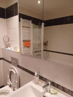 a bedroom with a bed in a room at 10min to the center Modern Flat in Prague