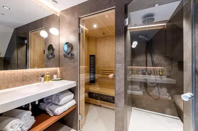 a bathroom with a sink and a shower at Yard Resort in Předboj
