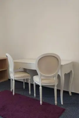 a desk and two chairs sitting next to a table at Just 3 min Walk Old Town Center private room B in Prague