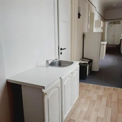 a white kitchen with a sink and a refrigerator at Just 3 min Walk Old Town Center private room C in Prague