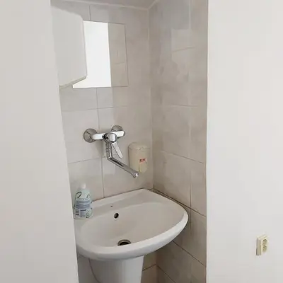 a bathroom with a toilet and a sink at Just 3 min Walk Old Town Center private room D in Prague