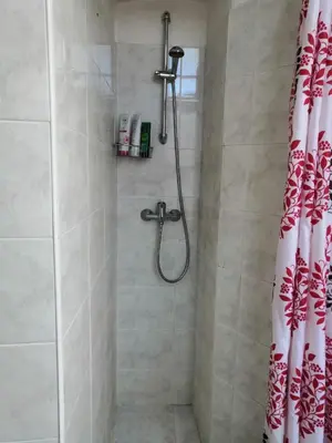 a bathroom with a shower with a shower curtain at 3 min Walk Old Town Center private room A in Prague