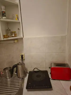 a kitchen counter with a tea kettle and a toaster at 3 min Walk Old Town Center private room A in Prague