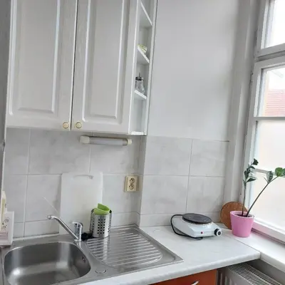 a kitchen with a sink and a toaster on a counter at 3 min Walk Old Town Center private room B in Prague