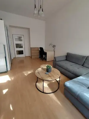 a living room with a couch and a coffee table at Apartment Near City Center! in Prague