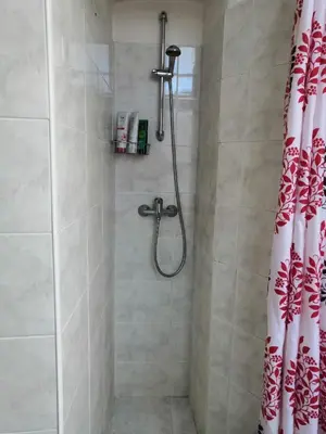 a bathroom with a shower with a shower curtain at 3 min Walk Old Town Center private room C in Prague