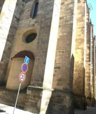 a clock tower with a bunch of signs on it at Charles bridge, Old town3 Min walk Private Room F in Prague