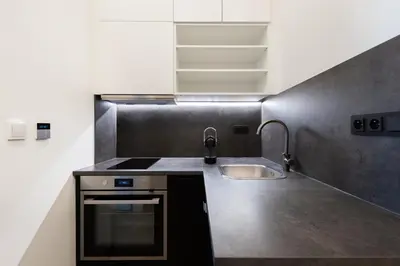 a kitchen with a sink and a counter top at Good Mood in the Zizkov Hood Prague in Prague