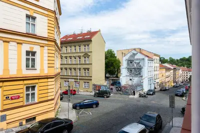a view of a street in a city with buildings at Good Mood in the Zizkov Hood Prague in Prague
