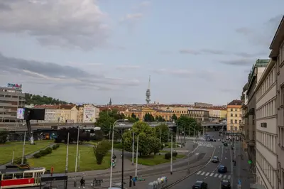 a view of a city with a street and buildings at Welcometothejungleapartment in Prague