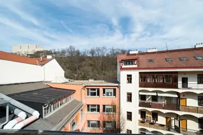 an overhead view of buildings in a city at Bright and airy apartment in unique suburb in Prague