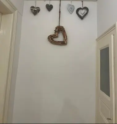 a room with hearts hanging on a wall at Štepánská 3 in Prague