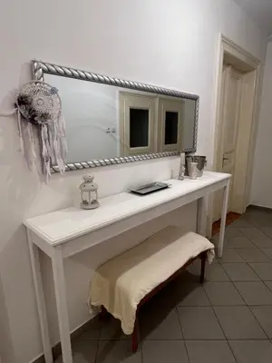 a bathroom with a white vanity with a mirror at Štepánská 3 in Prague