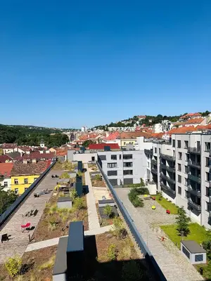 an aerial view of a city with buildings at Lengo Apartment Smichov in Prague