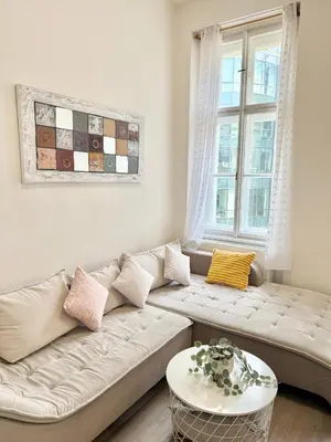 a living room with a couch and a table at FREE PARKING- 2BDR Apartment in Wenceslas Square in Prague