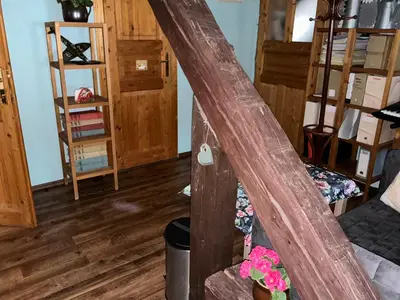 a room with a wooden archway in a room at Apartmány na náměstí - Kounice in Kounice