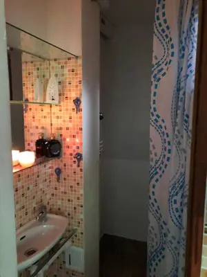a bathroom with a sink and a mirror at Apartmány na náměstí - Kounice in Kounice