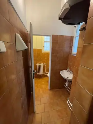 a bathroom with a sink and a toilet at Private Room With Free Parking Next to Railway Station in Prague
