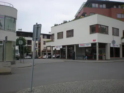 an empty street in a city with buildings at Sophia Cozy Self Catering Apartment in Dolní Břežany