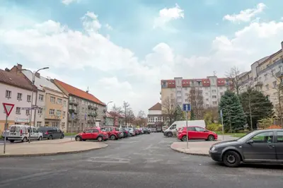 a bunch of cars parked in a parking lot at Penzion Staré Louny in Louny