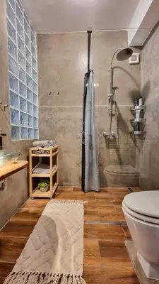 a bathroom with a shower and a toilet at Stylish Flat in Top Area ! New with Great Access in Prague