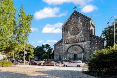 a church with cars parked in front of it at Charming Loft Studio Near Metro & Old Town in Prague