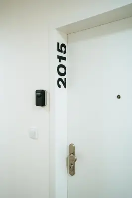 a door with the word foreclosure written on it at Blue Apartment - Vršovice in Prague