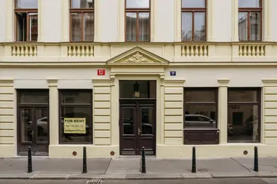 a building with doors and windows on a street at Prague Days - Fully Equipped Studio near Wenceslas Square in Prague