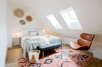 a bedroom with a bed and a window at Prague Days - Modern Apartments with AC near King's Park in Prague