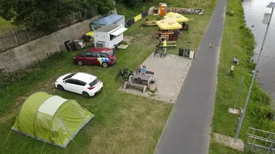 an aerial view of a group of tents and a car at Camp in Horní Počaply