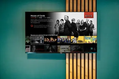 a poster for a house of cards on a wall at Central Riverside 2BD Apt by Vltava & Theater in Prague