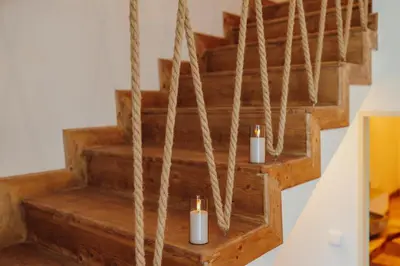 two candles on the stairs with ropes at Statek Pazderna