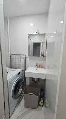 a large white door with a black and white floor at Relax Apartment in Prague