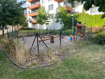 a playground in a park with a play area at UrbanFlat1615 with Parking in Prague