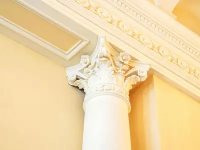 a white column on the side of a building at Apartment Washington-3 by Interhome in Prague