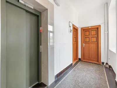 a corridor with a door in a building at Studio Art District Nook by Interhome in Prague