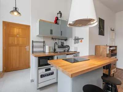 a kitchen with a sink and a counter top at Studio Art District Nook by Interhome in Prague
