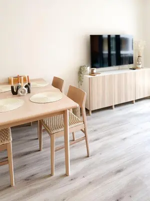 a dining room with a table and chairs and a tv at Jack apartman , 02 Arena ,PVA Expo, Free parking in Prague