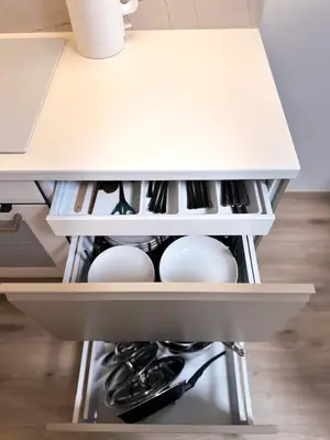 an open kitchen drawer with eggs in it at Amy apartman , 02 Arena, Free parking in Prague